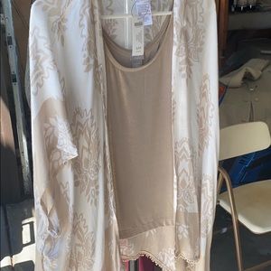 She goes tank top and cover-up